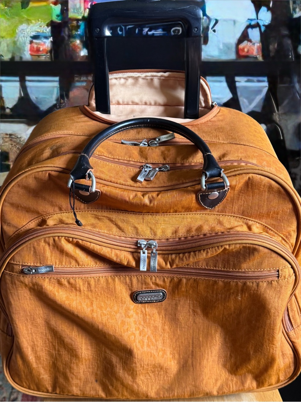 Baggallini Orange Leopard Nylon Rolling Carry-On Luggage